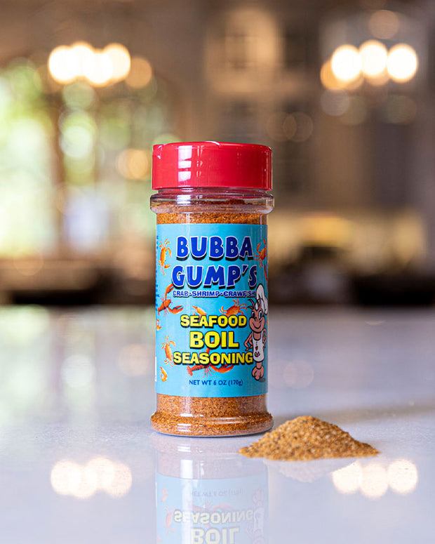 Bubba Gump's Seafood Boil Seasoning placed on top of table with background blurred.