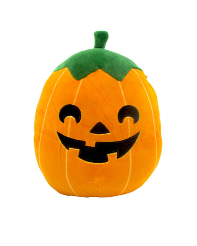 A cheerful plush toy pumpkin with a classic jack-o’-lantern face, featuring triangular eyes and a wide smile, set against a crisp white background.