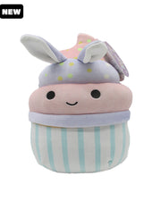 3 layer cupcake Squishmallow with bunny ears, sprinkles, pastel colors, a smiling face, and a black "New" tag in top corner.