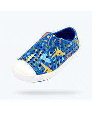 Side view of Dinosaur Print Slip On Shoes.