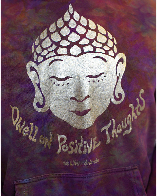 Close up look at center chest design featuring Buddah head and quote.