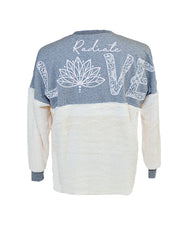 Back of jersey with lettering across back/shoulder area that says "Radiate Love" with "Radiate" being in cursive and 'Love" being in flowery bubble font