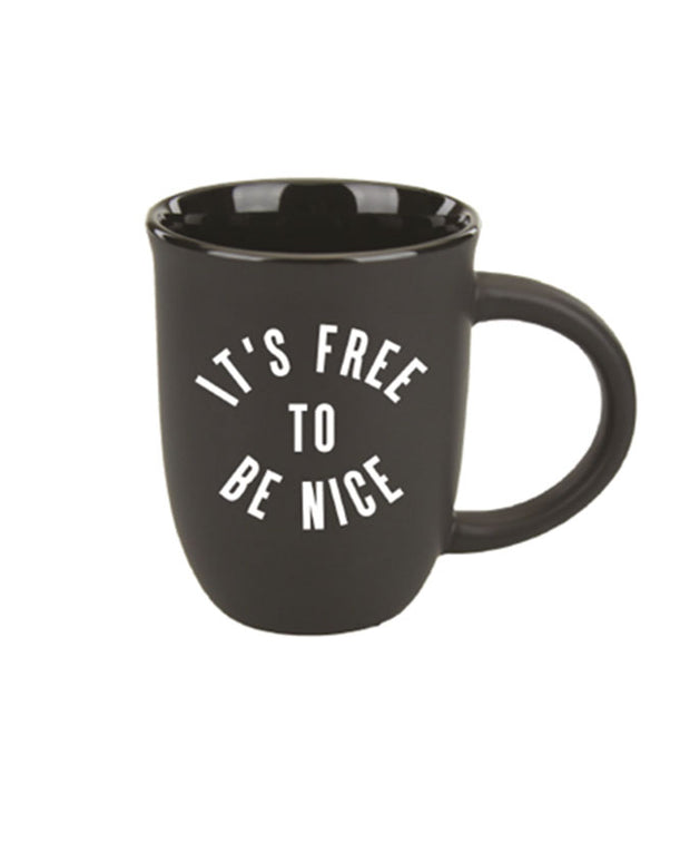 Dark brown mug with white lettering that says "It's Free To Be Nice"