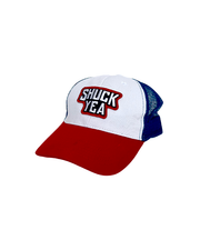 Mesh cap that has the phrase "Shuck Yea' embroidered on the front. back mesh is a navy blue, front is white and the bill is red.