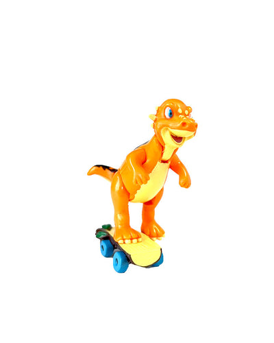 Orange and yellow Sly the Pachycephalosaurus riding a skateboard in front of white background.